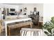 Charming kitchen with stainless steel appliances, island, and connected dining area at 20 S Buena Vista Ave # 111, Gilbert, AZ 85296