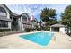 A community pool with lounge chairs and seating areas, perfect for enjoying the Arizona weather at 20 S Buena Vista Ave # 111, Gilbert, AZ 85296