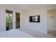 Bedroom featuring a large bed, neutral tones, and a mounted television at 20750 N 87Th St # 2115, Scottsdale, AZ 85255