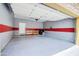 Spacious garage with epoxy flooring, custom painted walls, and ample space for storage and parking at 20750 N 87Th St # 2115, Scottsdale, AZ 85255