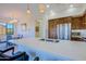 Bright kitchen boasts a center island, stainless appliances, and adjacent dining area at 20750 N 87Th St # 2115, Scottsdale, AZ 85255