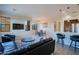 Open living area featuring a modern kitchen, dining space, and comfortable seating arrangement at 20750 N 87Th St # 2115, Scottsdale, AZ 85255