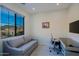 Bright office space featuring modern desk, seating and a large window with mountain views at 20750 N 87Th St # 2115, Scottsdale, AZ 85255