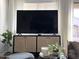Stylish living room features a large television and modern decor at 2150 E Bell Rd # 1068, Phoenix, AZ 85022