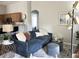 Stylish living room with a blue sofa, patterned rug, and modern accents, perfect for relaxing or entertaining at 2150 E Bell Rd # 1068, Phoenix, AZ 85022