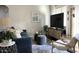 Inviting living room with a large TV, stylish decor, and comfortable seating for a cozy atmosphere at 2150 E Bell Rd # 1068, Phoenix, AZ 85022