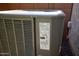 Up close view of the property's Lennox air conditioner showing unit specifications and installation instructions at 21883 N 263Rd Dr, Buckeye, AZ 85396
