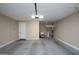 Spacious garage equipped with a sink, water heater and ample room for parking at 21883 N 263Rd Dr, Buckeye, AZ 85396