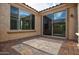 Open patio is constructed from pavers with a covered section at 21883 N 263Rd Dr, Buckeye, AZ 85396
