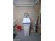 Image features a water softener with connections in an organized utility area at 21883 N 263Rd Dr, Buckeye, AZ 85396