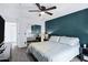 Spacious bedroom featuring a mirrored closet and ceiling fan, offering style and comfort at 2201 N Comanche Dr # 1093, Chandler, AZ 85224