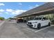 Convenient covered parking area with assigned spaces, providing protection from the elements at 2201 N Comanche Dr # 1093, Chandler, AZ 85224