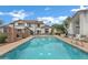 Spacious community pool surrounded by lounge chairs, perfect for hot Arizona days at 2201 N Comanche Dr # 1093, Chandler, AZ 85224