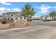College Park Woods community sign with lush landscaping and ample parking for residents and guests at 2201 N Comanche Dr # 1093, Chandler, AZ 85224