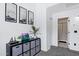 Bright hallway featuring stylish decor, convenient storage, and easy access to the bathroom at 2201 N Comanche Dr # 1093, Chandler, AZ 85224