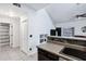Open concept kitchen features sleek appliances, and a breakfast bar seating area at 2201 N Comanche Dr # 1093, Chandler, AZ 85224