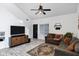 Inviting living room with a vaulted ceiling, ceiling fan, and stylish décor at 2201 N Comanche Dr # 1093, Chandler, AZ 85224