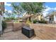 Private outdoor patio featuring a brick wall and flagstone paving, ideal for relaxing and entertaining at 2201 N Comanche Dr # 1093, Chandler, AZ 85224
