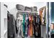 Organized walk-in closet providing ample storage space for clothes and accessories at 2201 N Comanche Dr # 1093, Chandler, AZ 85224