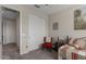 A bedroom featuring neutral walls, a trundle bed, desk, and a closet at 22136 N 28Th Pl, Phoenix, AZ 85050