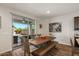 Charming dining area with a large sliding glass door to the outdoor living space at 22136 N 28Th Pl, Phoenix, AZ 85050