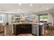 Open concept kitchen with granite counters, stainless appliances, and view of living space at 22136 N 28Th Pl, Phoenix, AZ 85050