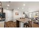 Modern kitchen with a center island and an open floor plan to the living area at 22136 N 28Th Pl, Phoenix, AZ 85050