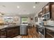 Gourmet kitchen with stainless steel appliances and plenty of granite counter space at 22136 N 28Th Pl, Phoenix, AZ 85050