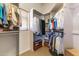 Walk-in closet with hanging storage, shelving and shoe rack at 23760 N 80Th Way, Scottsdale, AZ 85255