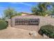 Desierto Vida community entrance sign with desert landscaping on a sunny day at 23760 N 80Th Way, Scottsdale, AZ 85255