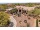 Beautiful southwestern home features native landscaping, a tile roof, and a grand entrance at 23760 N 80Th Way, Scottsdale, AZ 85255