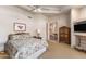 Inviting main bedroom with comfortable bedding and an open doorway leading to a secondary room at 23760 N 80Th Way, Scottsdale, AZ 85255