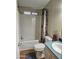 Bathroom features a shower/tub combo, commode, and updated fixtures at 2400 E Baseline Ave # 201, Apache Junction, AZ 85119