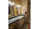 Bathroom features a spacious vanity, shower/tub combo, and updated fixtures at 2400 E Baseline Ave # 201, Apache Junction, AZ 85119