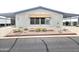 Charming single-story home featuring covered parking, well-maintained landscaping, and easy street access at 2400 E Baseline Ave # 201, Apache Junction, AZ 85119
