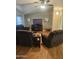 Inviting living room boasts vaulted ceiling, updated flooring, and cozy, plush furnishings at 2400 E Baseline Ave # 201, Apache Junction, AZ 85119