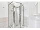 This bathroom features a tiled walk-in shower with glass doors and modern fixtures at 2546 N 9Th St, Phoenix, AZ 85006