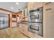 Contemporary kitchen featuring stainless steel double ovens and custom cabinetry at 2546 N 9Th St, Phoenix, AZ 85006