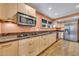 Well-equipped kitchen with stainless steel appliances, custom cabinets, and granite countertops at 2546 N 9Th St, Phoenix, AZ 85006