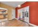 Bright, airy living room with open doorway to den and kitchen at 2546 N 9Th St, Phoenix, AZ 85006