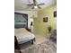Bright bedroom with neutral colors, a ceiling fan, and ensuite access at 2635 W Hearn Rd, Phoenix, AZ 85023