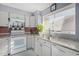 Bright kitchen featuring modern appliances, sleek countertops, and ample cabinet space for storage at 2635 W Hearn Rd, Phoenix, AZ 85023