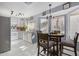 Bright kitchen with stainless steel appliances, ample counter space, and an adjacent dining area at 2635 W Hearn Rd, Phoenix, AZ 85023