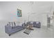 Spacious living room with vaulted ceilings, stylish furnishings, and sleek, modern decor at 2635 W Hearn Rd, Phoenix, AZ 85023