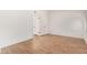 Bedroom with wood-look floors, base molding, and white walls at 2834 S Extension Rd # 2005, Mesa, AZ 85210