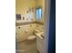 Features a quaint bathroom with whimsical decorations, a toilet, and a sink vanity at 3115 N 26Th St, Phoenix, AZ 85016