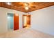 Bedroom features a ceiling fan, wood ceiling, and closet space at 3115 N 26Th St, Phoenix, AZ 85016