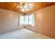 Cozy bedroom featuring natural light, a ceiling fan, and neutral-toned walls at 3115 N 26Th St, Phoenix, AZ 85016