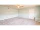 Spacious bedroom with neutral carpet, ceiling fan and neutral light at 3115 N 26Th St, Phoenix, AZ 85016