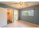Bedroom with tile floor, walk-in closet, ensuite bathroom, and natural light at 3115 N 26Th St, Phoenix, AZ 85016
